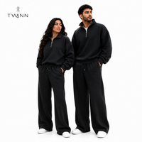 ترينج TWYNN نصف سوستة وبنطلون واسع — أسود